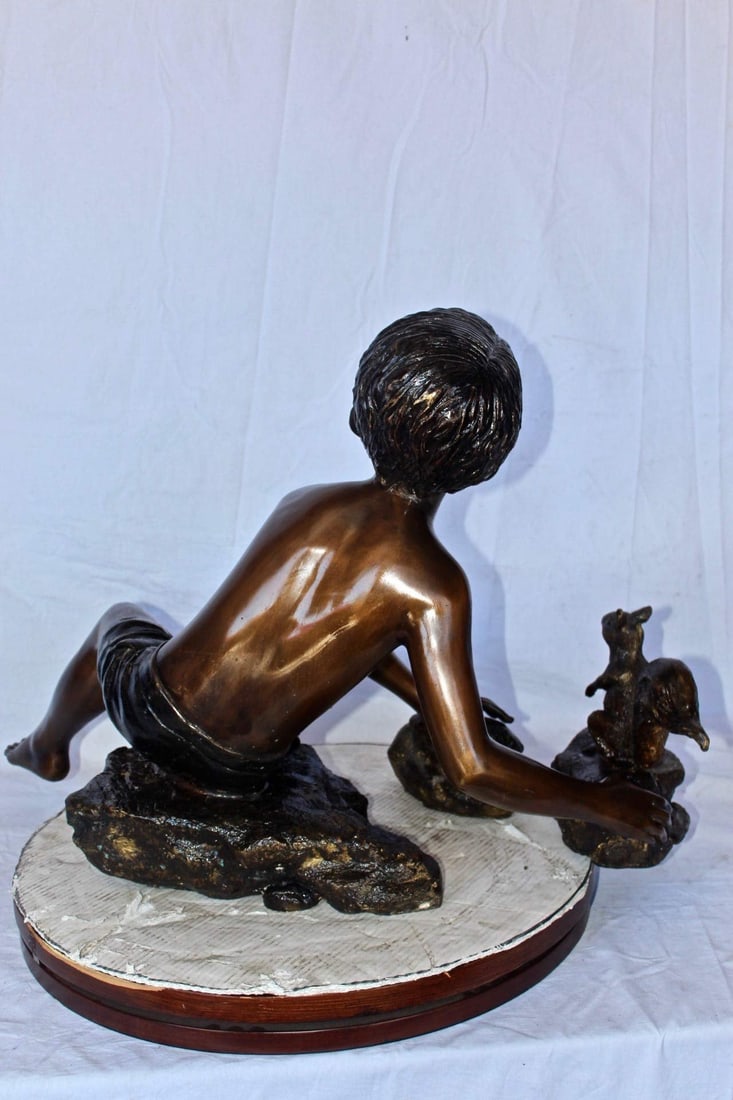 Adventurous boy with squirrel bronze statue - Size: 36"L x 18"W x 22"H. - 8
