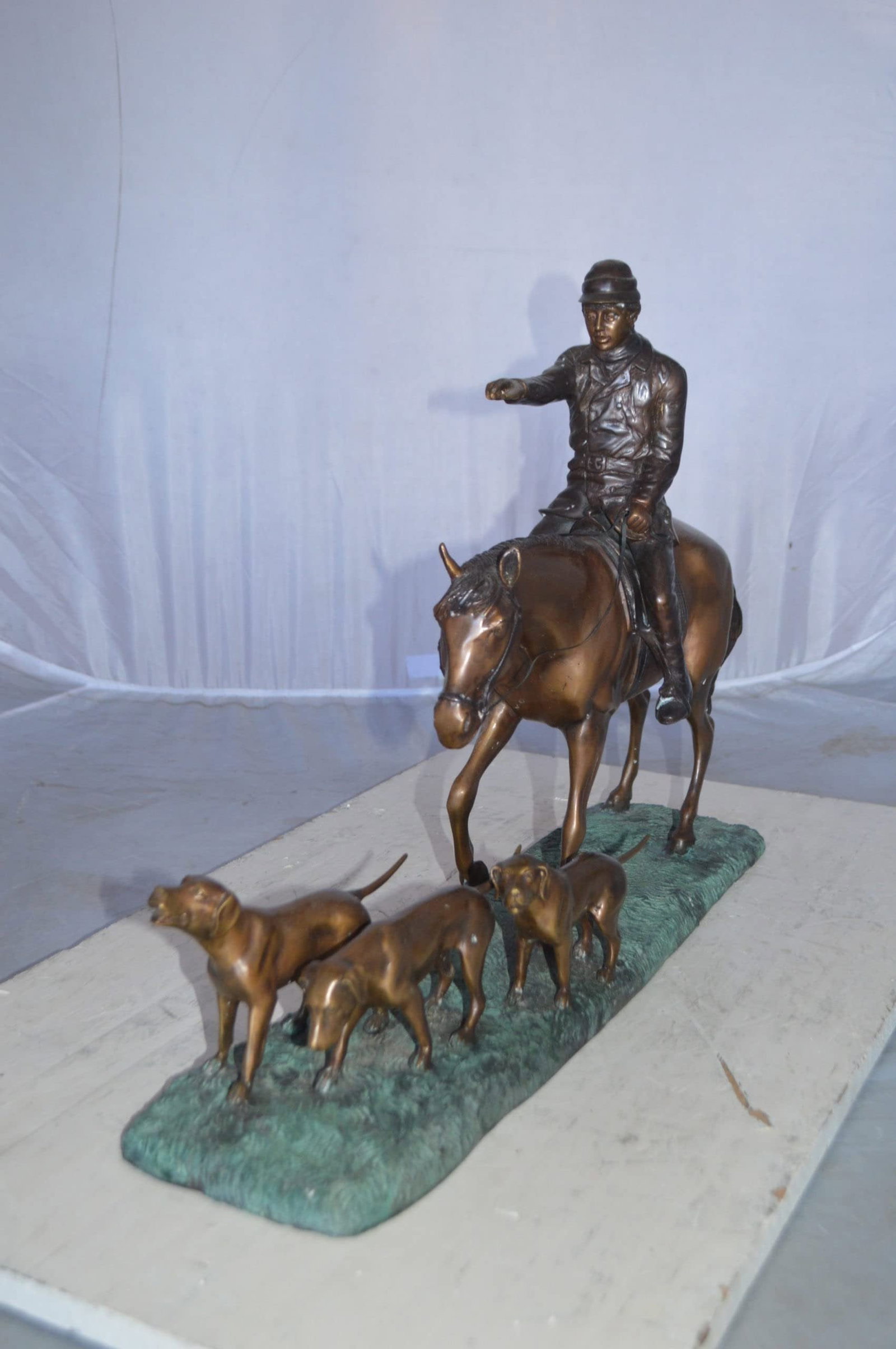 Hunter with three dogs Bronze Statue - Size: 27"L x 6"W x 18"H. - 10