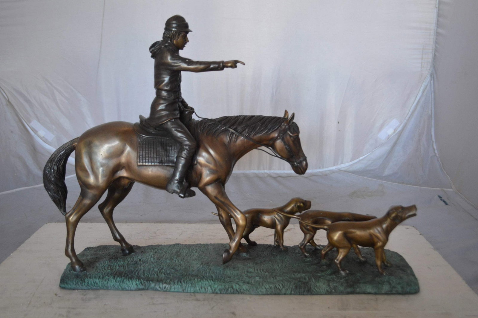 Hunter with three dogs Bronze Statue - Size: 27"L x 6"W x 18"H. - 4