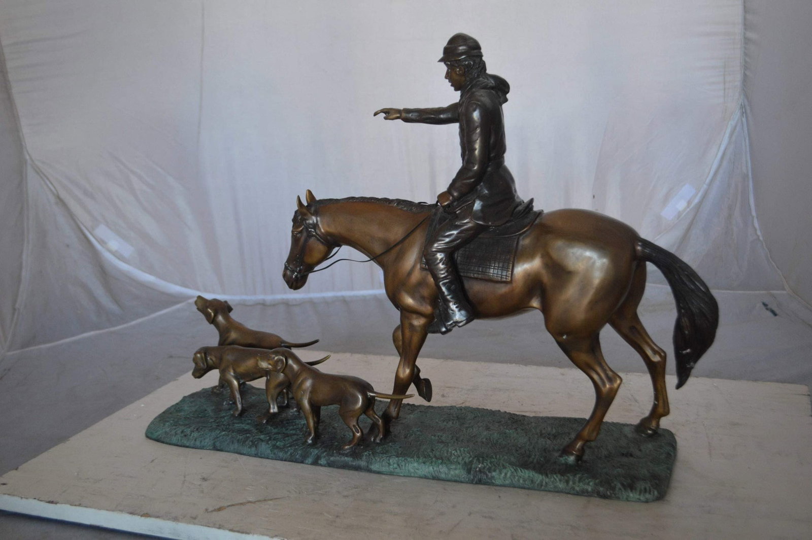 Hunter with three dogs Bronze Statue - Size: 27"L x 6"W x 18"H. - 8