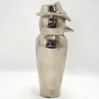 Art Deco Chrome Penguin In A Fedora Figure: Title:Art Deco Chrome Penguin In A Fedora FigureSize:2 ? in (6.4 cm) diameter x 6 ? in (17.1 cm) tall.Description:A unique Art Deco treasure, this chrome-plated penguin in a fedora combines weight