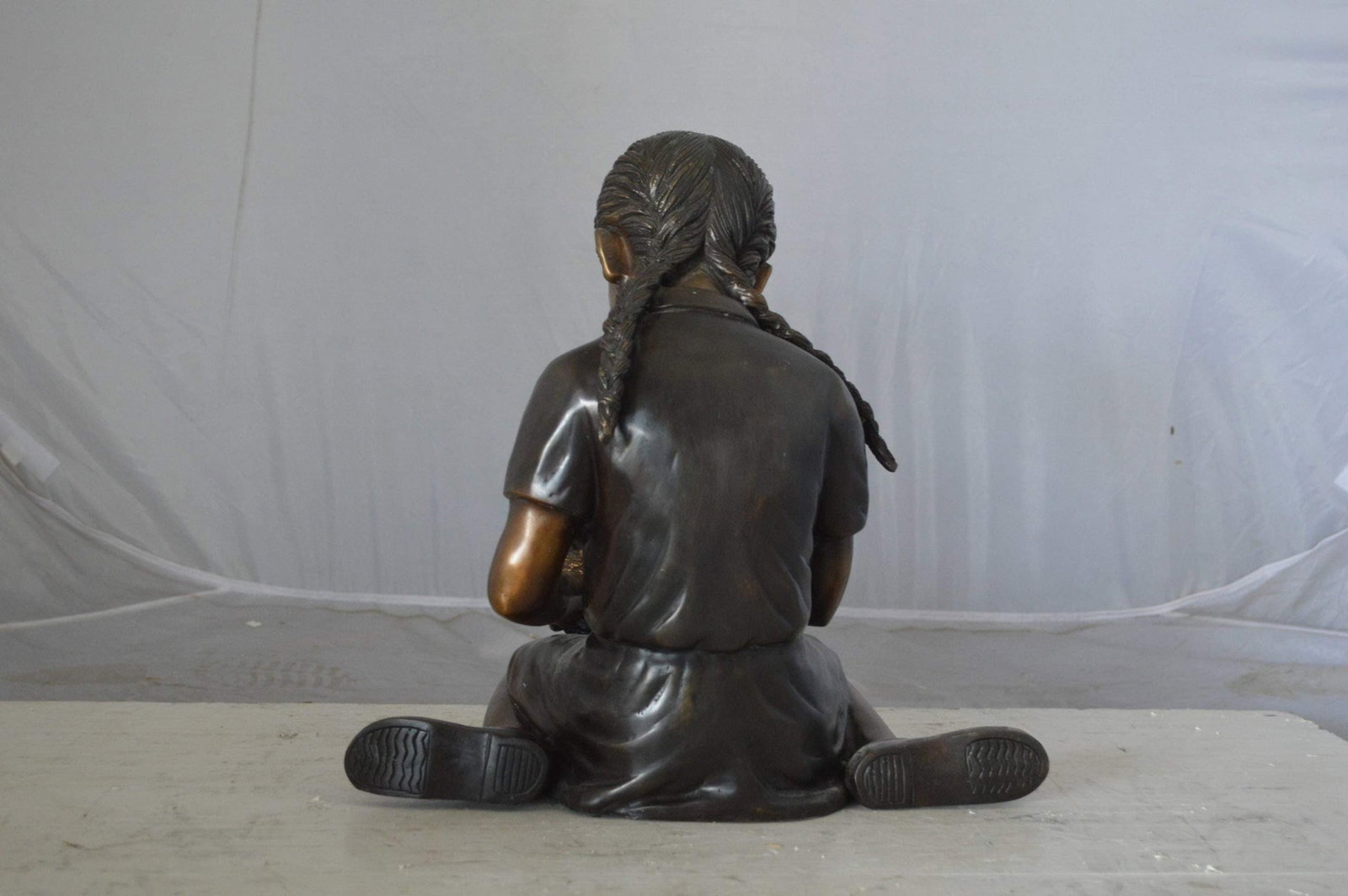 Young seated girl with bird bronze statue - Size: 12"L x 9"W x 14"H. - 10