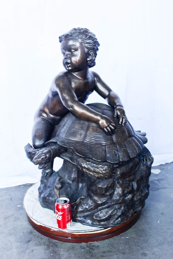 Naked toddler on turtle bronze statue Art Nude - Size: 23"L x 26"W x 34"H. - 5