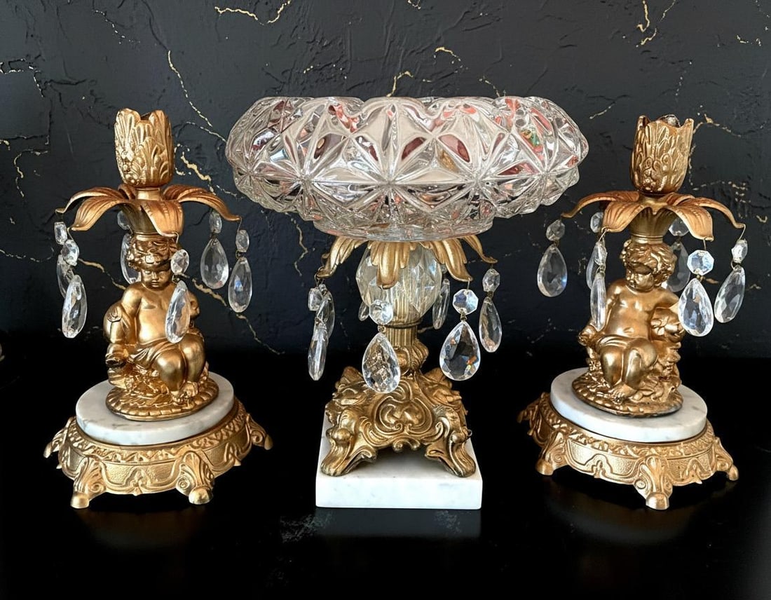 Hollywood Regency Cherub 3 Piece Set L&L WMC Gold Crystal Pedestal Bowl & Candle Holders: Title:Hollywood Regency Cherub 3 Piece Set L&L WMC Gold Crystal Pedestal Bowl & Candle HoldersDescription:This listing is for a Hollywood Regency three piece set featuring a pair of L & L WMC cherub