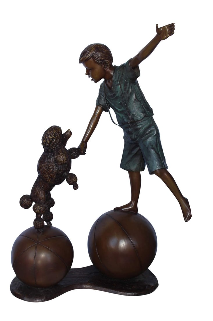 Boy and poodle balancing circus stars bronze statue - Size: 38" x 27" x 55"H.: Title:Boy and poodle balancing circus stars bronze statue - Size: 38" x 27" x 55"H.Description:Transport your room into an adorable and lighthearted space with this large bronze statue. Depicting a