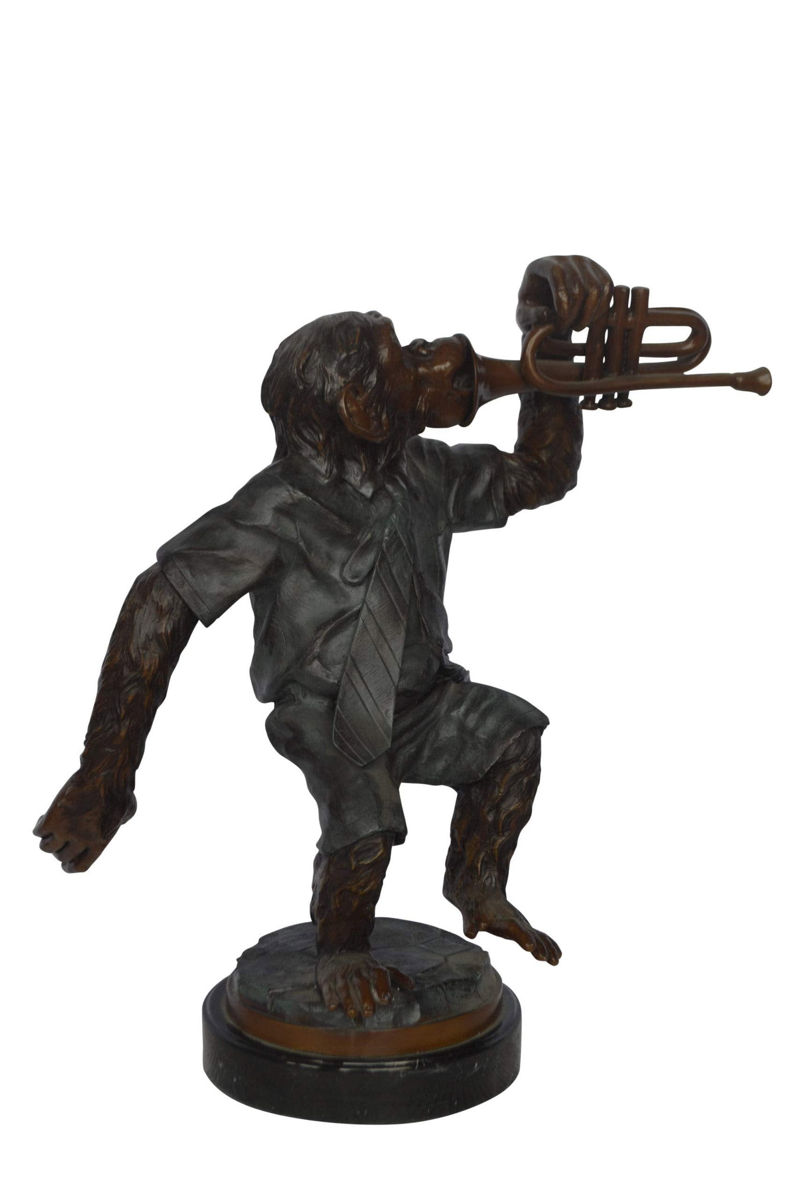 Monkey With Trumpet Bronze Statue - Size: 24"L x 12"W x 26"H.: Title:Monkey With Trumpet Bronze Statue - Size: 24"L x 12"W x 26"H.Description:This humorous bronze statue is of a monkey casually walking while playing his pride and joy, the trumpet. This work of