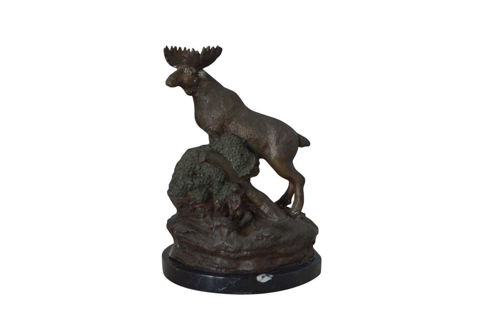 Moose on a rock bronze statue - Size: 9"L x 7"W x 14"H.: Title:Moose on a rock bronze statue - Size: 9"L x 7"W x 14"H.Description:This bronze statue of a moose on a rock is a great addition to any room or office. The artist made sure to use exquisite