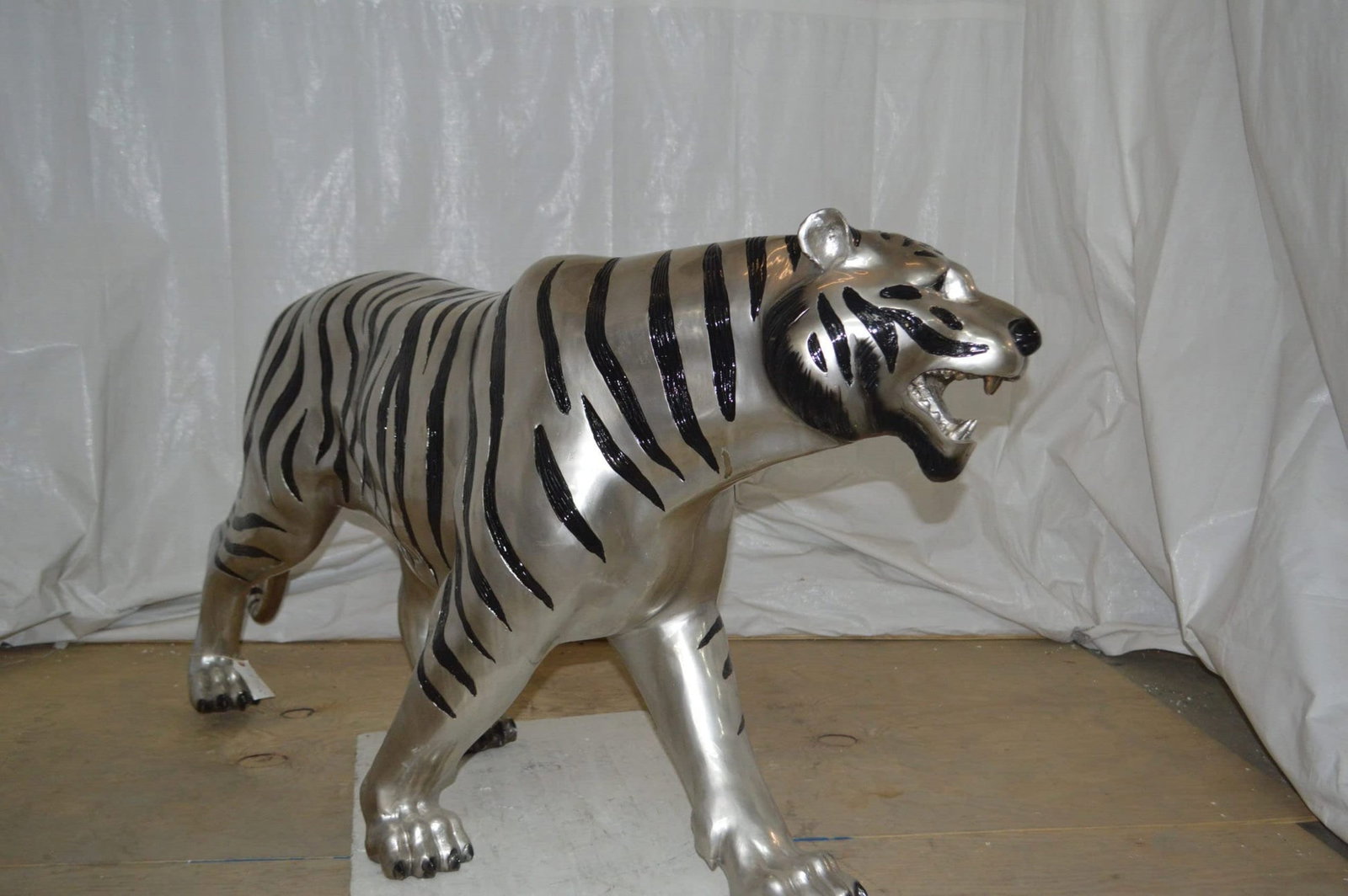 Tiger bronze statue with black and silver finish - Size: 80"L x 15"W x 34"H. - 10