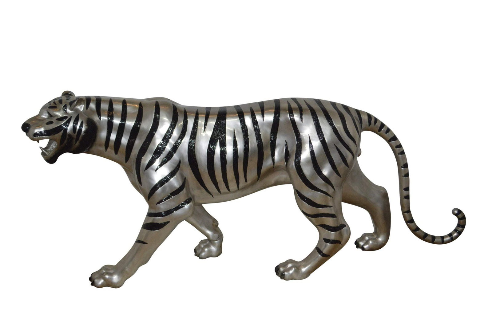 Tiger bronze statue with black and silver finish - Size: 80"L x 15"W x 34"H.: Title:Tiger bronze statue with black and silver finish - Size: 80"L x 15"W x 34"H.Description:Pierce your eyes on this powerful bronze statue of a tiger ready to capture his prey. With mouth wide