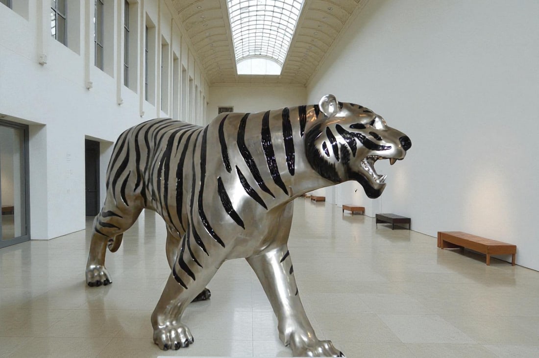 Tiger bronze statue with black and silver finish - Size: 80"L x 15"W x 34"H. - 2