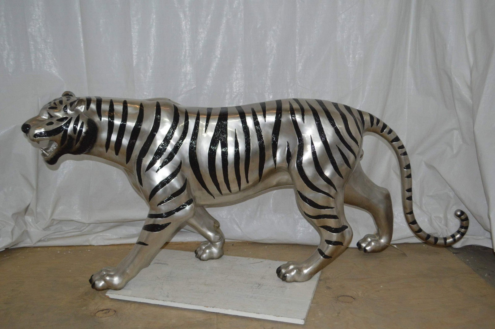 Tiger bronze statue with black and silver finish - Size: 80"L x 15"W x 34"H. - 5