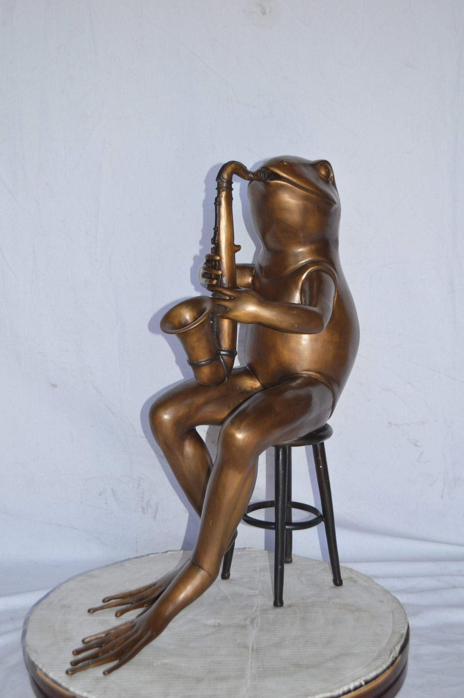 Frog playing saxophone bronze statue - Size: 23"L x 15"W x 30"H. - 3