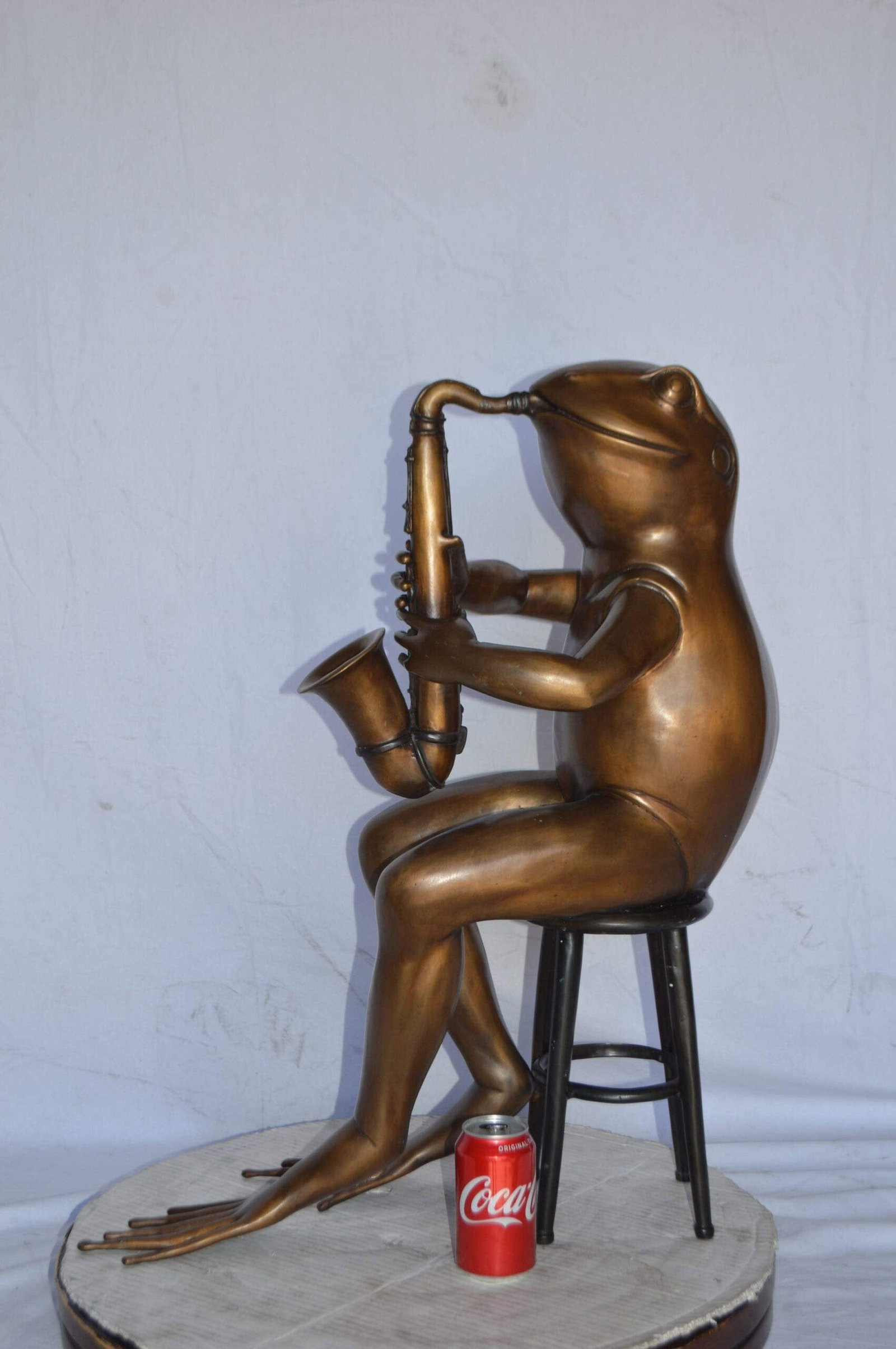 Frog playing saxophone bronze statue - Size: 23"L x 15"W x 30"H. - 5