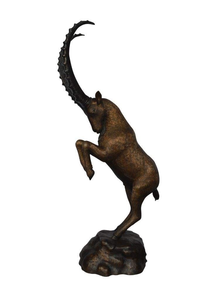 Mountain goat on hind legs bronze statue - Size: 36"L x 16"W x 66"H.: Title:Mountain goat on hind legs bronze statue - Size: 36"L x 16"W x 66"H. Description:This bronze statue depicts an ibex, a species of mountain goat. Clearly on its hind legs, there is a wild aura pr