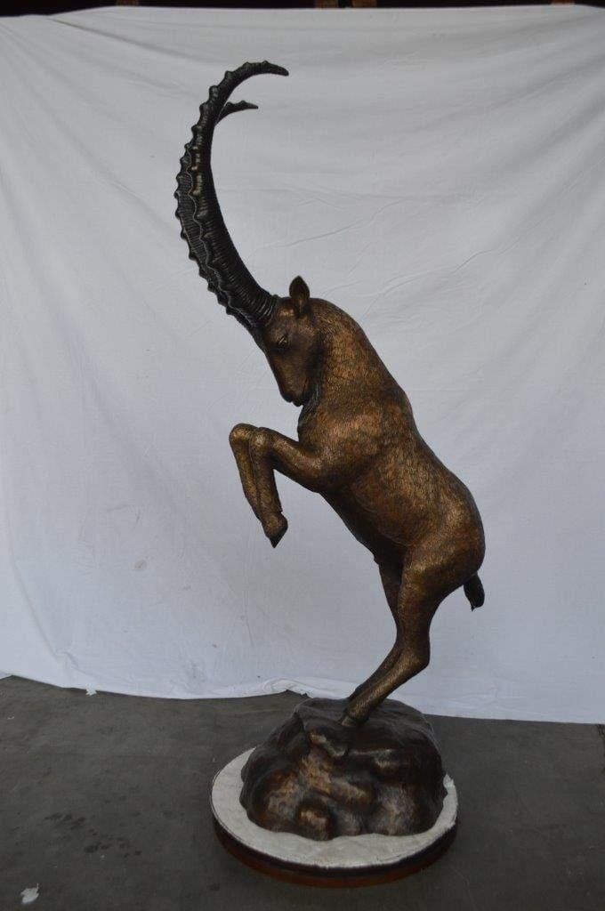 Mountain goat on hind legs bronze statue - Size: 36"L x 16"W x 66"H. - 3