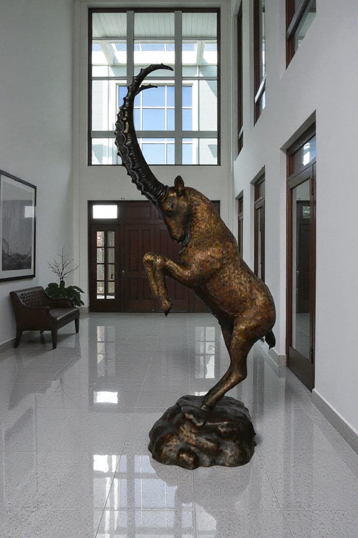 Mountain goat on hind legs bronze statue - Size: 36"L x 16"W x 66"H. - 4