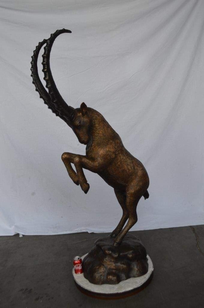 Mountain goat on hind legs bronze statue - Size: 36"L x 16"W x 66"H. - 6