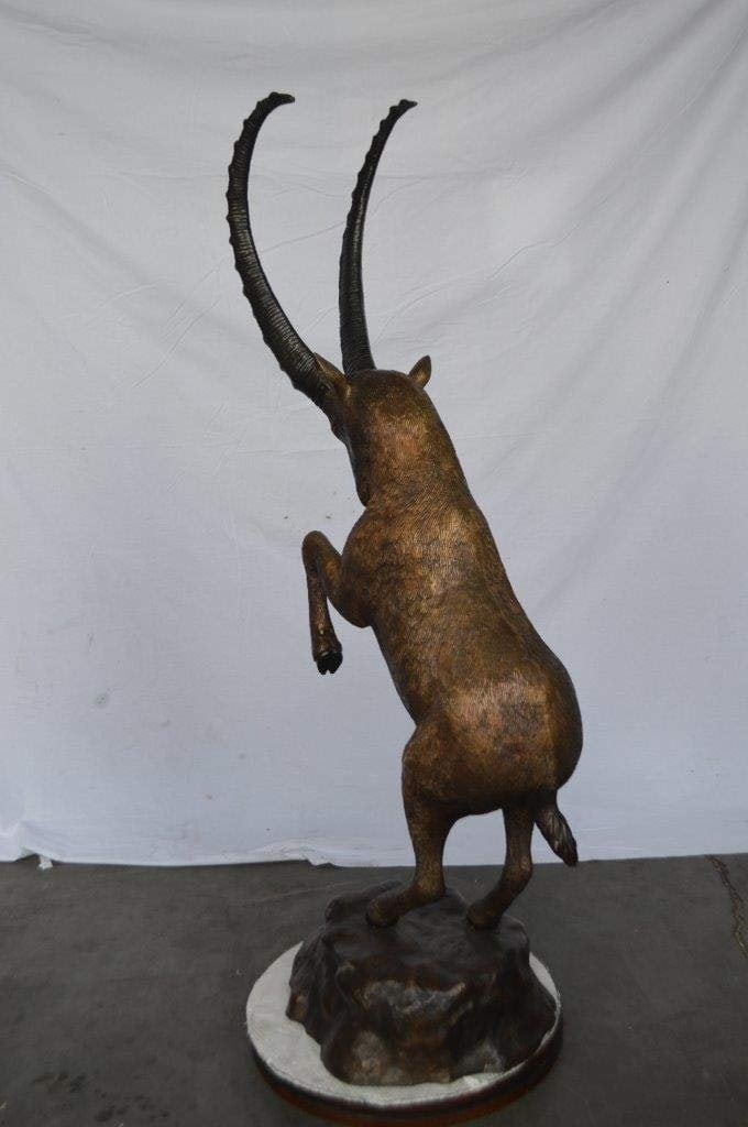 Mountain goat on hind legs bronze statue - Size: 36"L x 16"W x 66"H. - 8