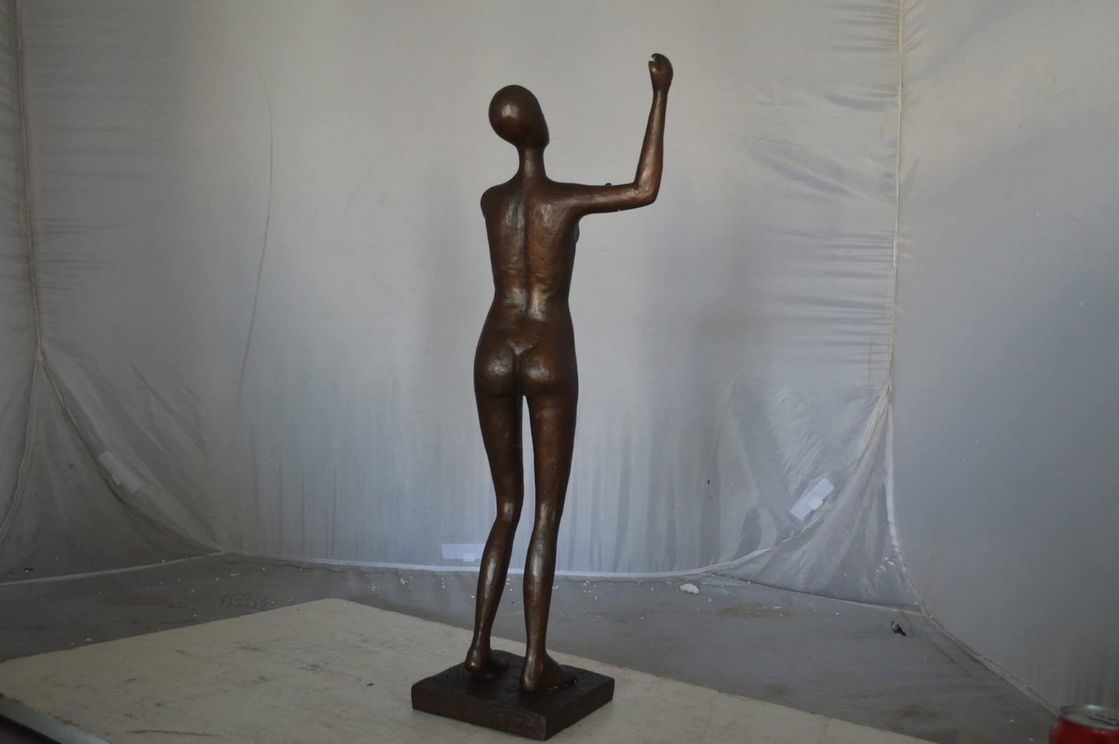 Abstract of Art nude lady lifting hand bronze statue - Size: 9"L x 6"W x 25"H. - 10