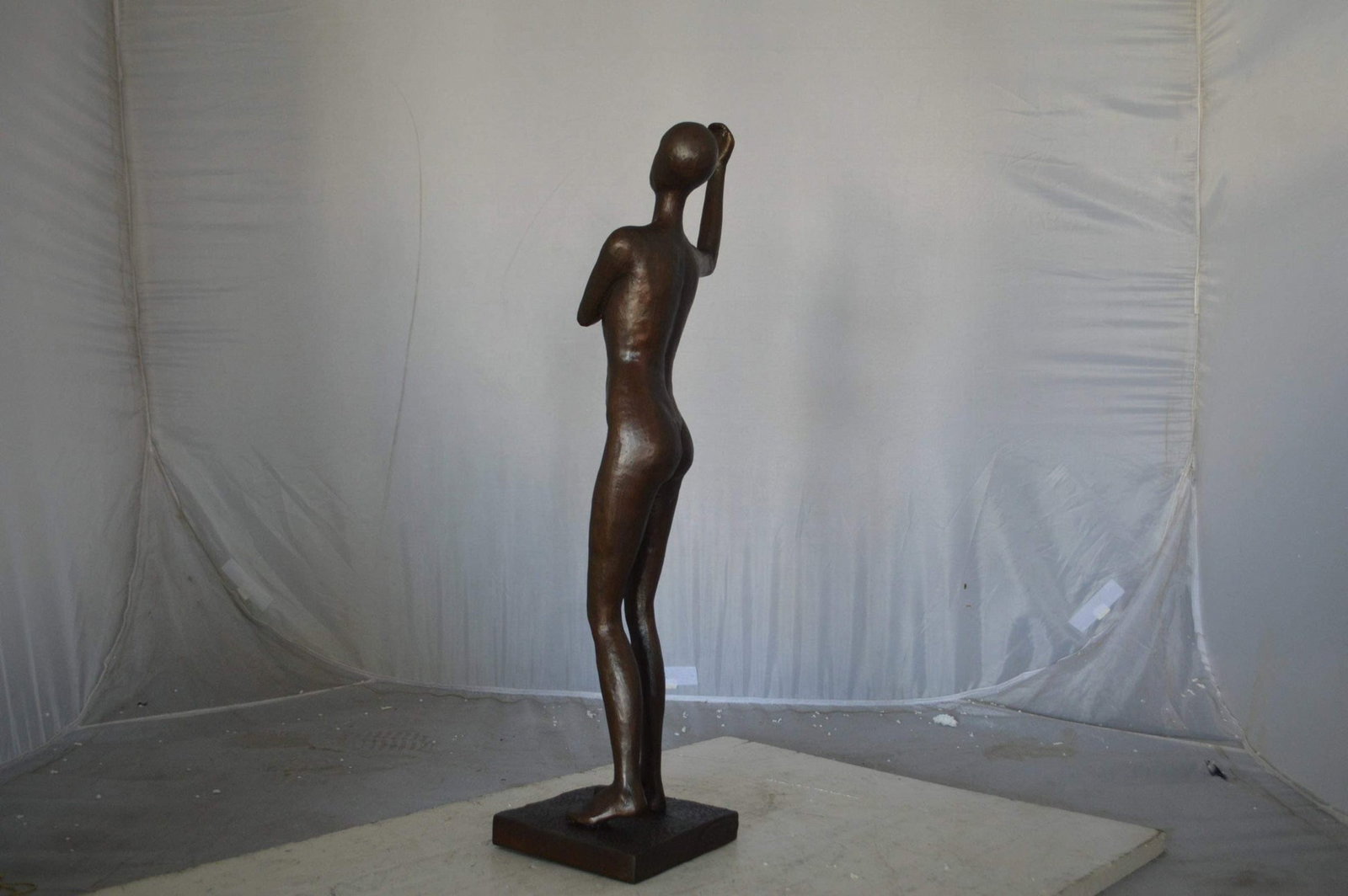 Abstract of Art nude lady lifting hand bronze statue - Size: 9"L x 6"W x 25"H. - 8