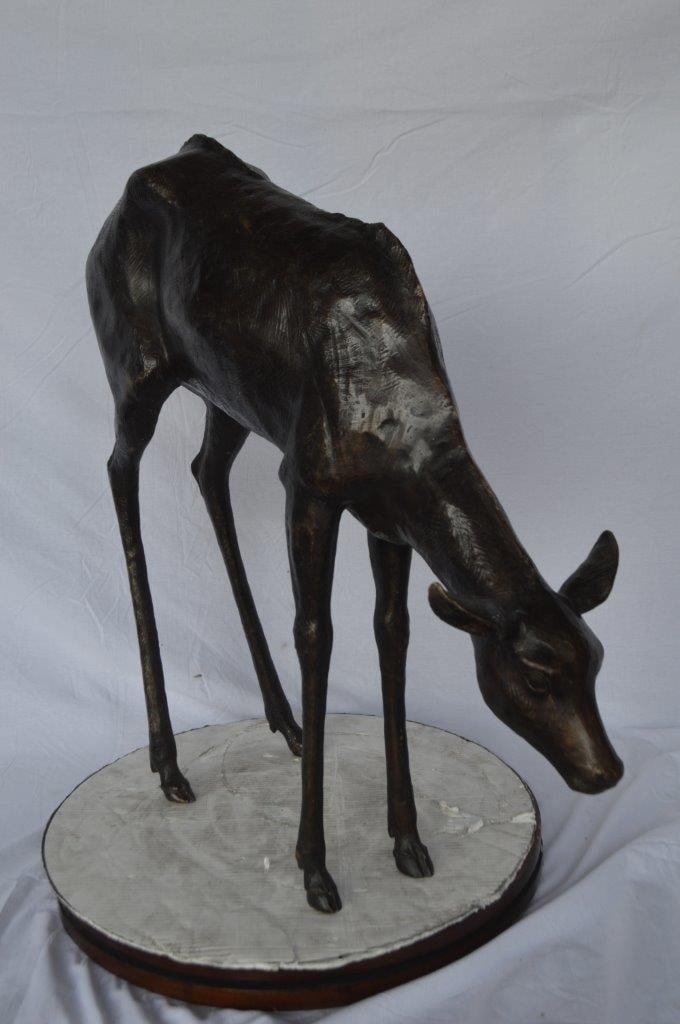 Life Size Grazing Deer Bronze Statue ? Elegant Wildlife Sculpture with Graceful Detailing for Home,: Title:Life Size Grazing Deer Bronze Statue ? Elegant Wildlife Sculpture with Graceful Detailing for Home, Garden, or Patio Decor ? 33" L x 9" W x 34" H Description:This beautiful bronze sculpture of a