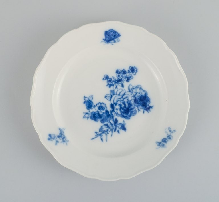 Four antique Meissen dinner plates. Hand painted with various blue flowers and butterflies. (1 of 7)