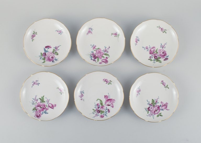 Six antique Meissen plates, hand painted with polychrome flowers and gold edge. (1 of 8)