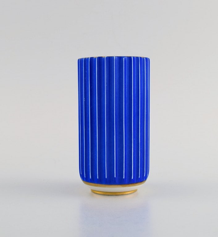 Early blue Lyngby porcelain vase in with gold decoration. Mid 20th century.: Title: Early blue Lyngby porcelain vase in with gold decoration. Mid 20th century. Description: Early blue Lyngby porcelain vase in with gold decoration. Mid 20th century. Measures: 10.3 x 5.5 cm. In