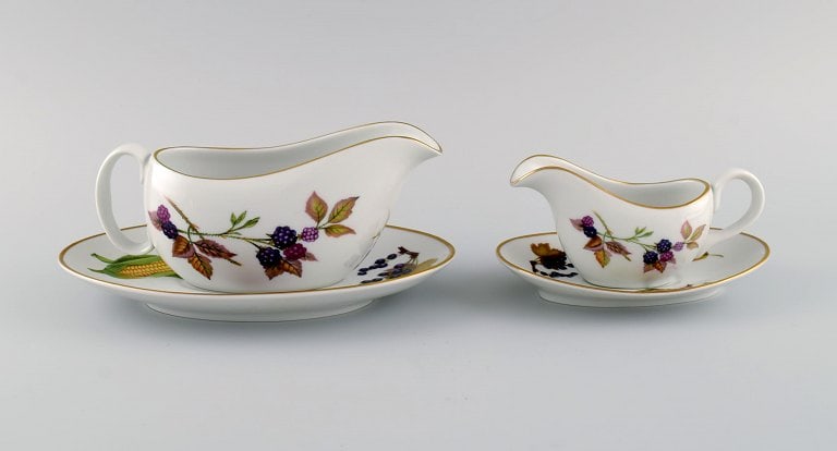 Royal Worcester, England. Two Evesham sauce jugs with saucers in porcelain decorated with fruits and (1 of 4)