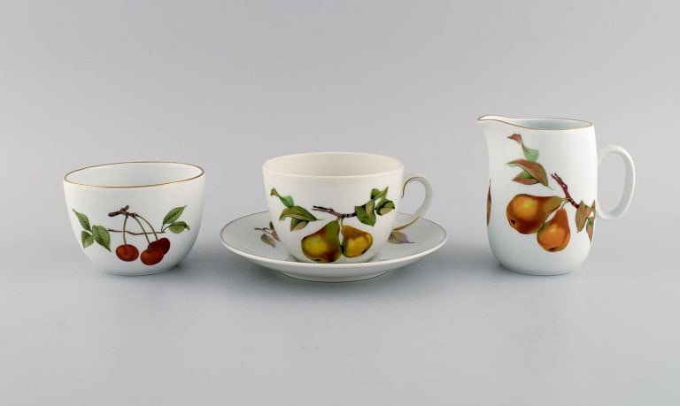 Royal Worcester, England. Evesham porcelain morning cup with sugar bowl and cream jug decorated with (1 of 7)