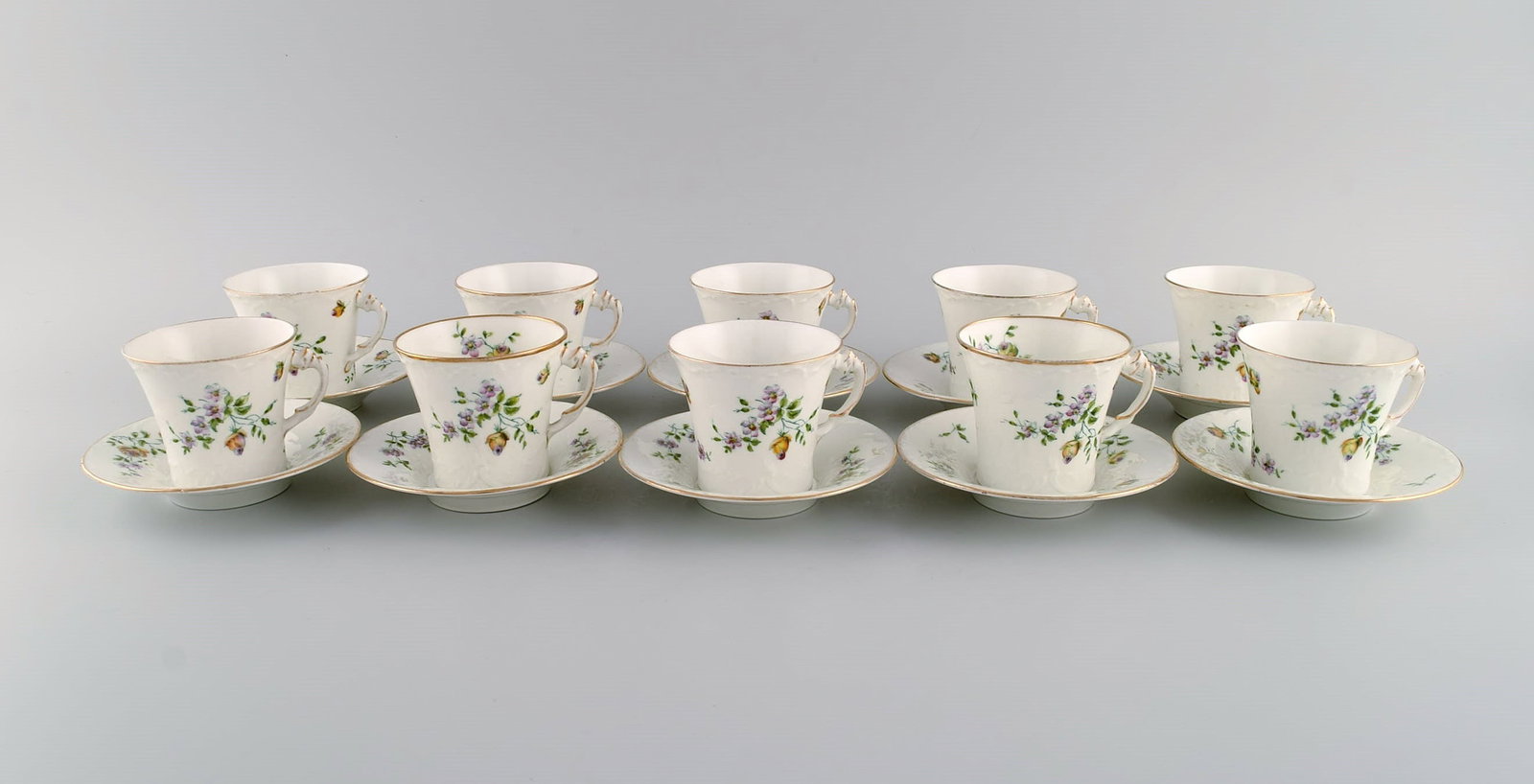 10 Rörstrand coffee cups with saucers in hand-painted porcelain. Flowers, gold edge and foliage (1 of 6)