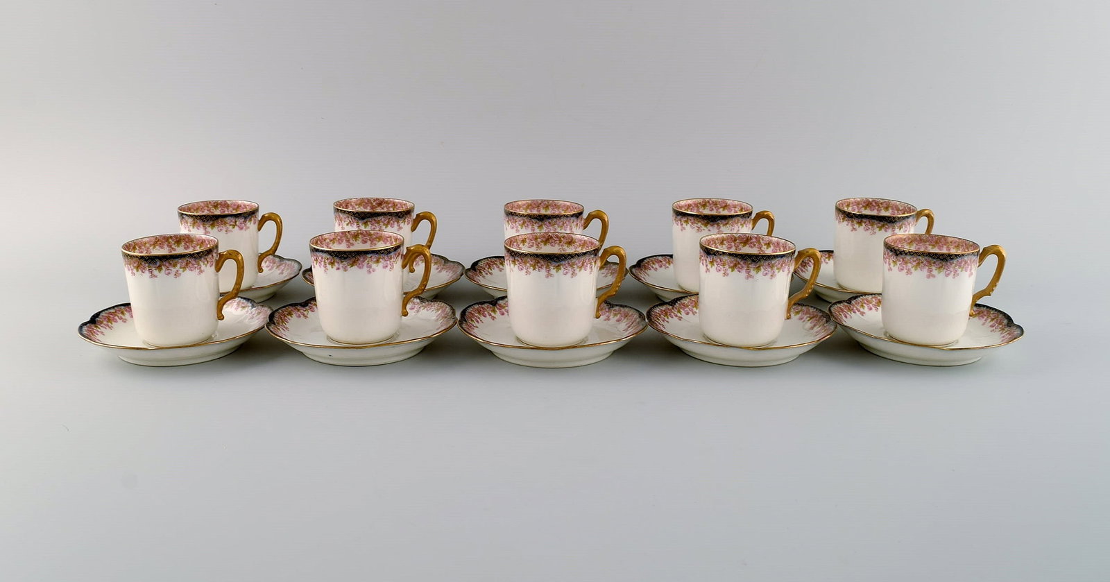 Limoges, France. 10 mocha cups with saucers in hand-painted porcelain. Pink flowers and gold edge. (1 of 6)