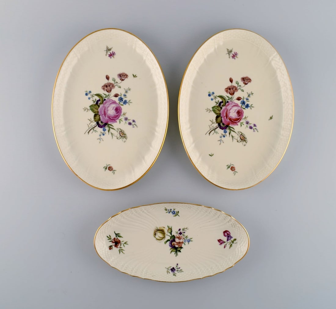 Three Royal Copenhagen Frijsenborg dishes in hand-painted porcelain with flowers and gold edge. (1 of 5)