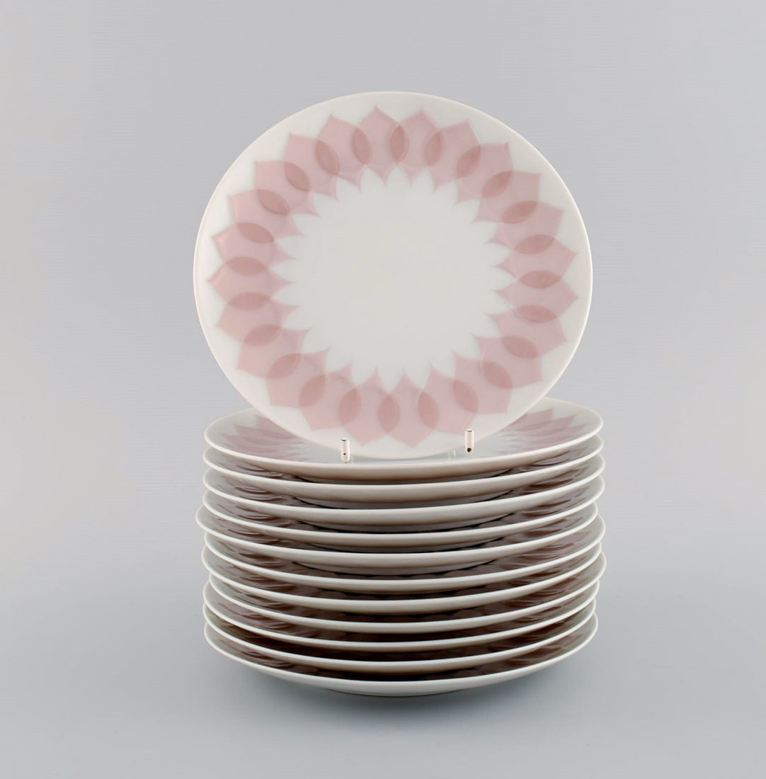 Bjørn Wiinblad for Rosenthal. Lotus porcelain service. Twelve plates decorated with pink lotus (1 of 4)