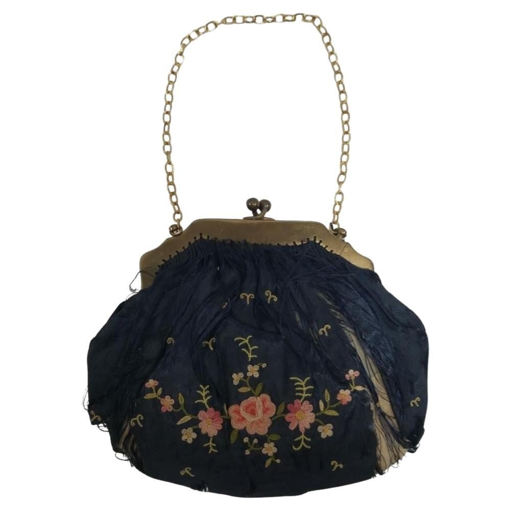 Antique Hand-Embroided Silk Purse 1910: Title: Antique Hand-Embroided Silk Purse 1910 Description: Elevate your style with this exquisite antique hand-embroidered silk purse dating back to 1910, a true testament to the craftsmanship of a