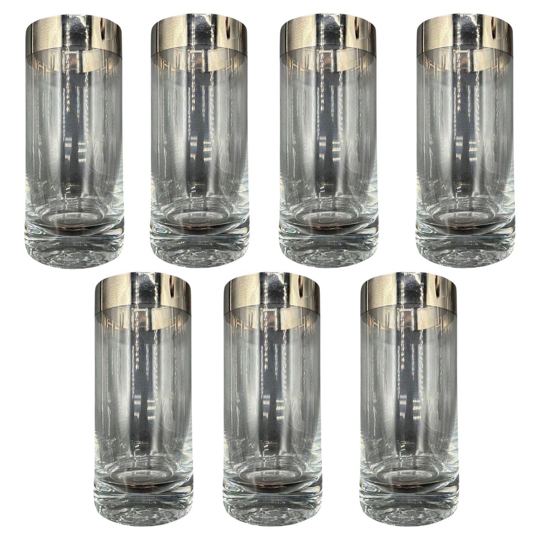 Set of 7 Barware HighBall Tumbler Glass w/ Silver Rim by Dorothy Thorpe: Title: Set of 7 Barware HighBall Tumbler Glass w/ Silver Rim by Dorothy Thorpe Description: This exquisite set of seven Tom Collins silver barware cups by Dorothy Thorpe epitomizes elegance in Mid-cen