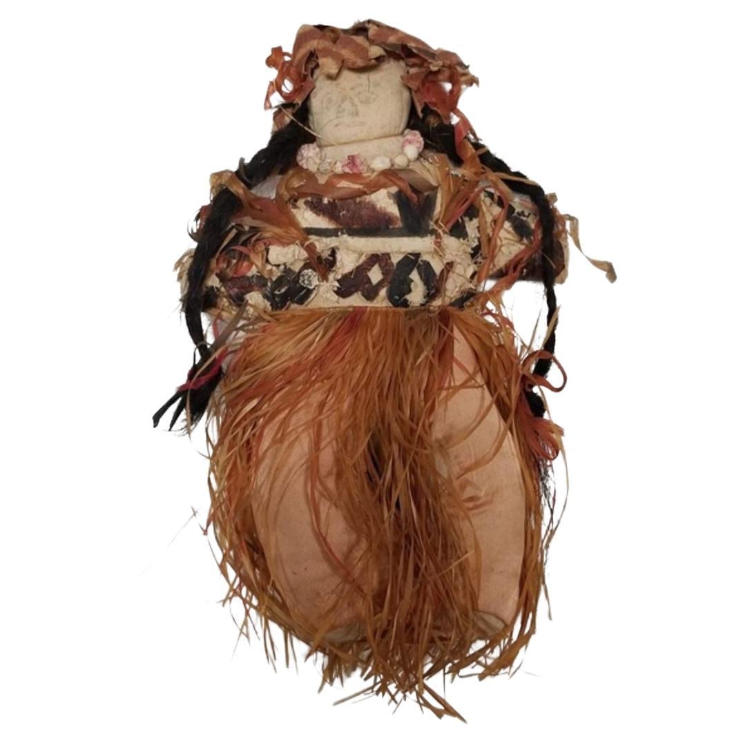 Vintage 1930s HANDMADE Hawaiian Doll.: Title: Vintage 1930s HANDMADE Hawaiian Doll. Description: Step into a time when craftsmanship was king with our beautifully handmade Hawaiian Doll from the early 20th century. This ceremonial gem is