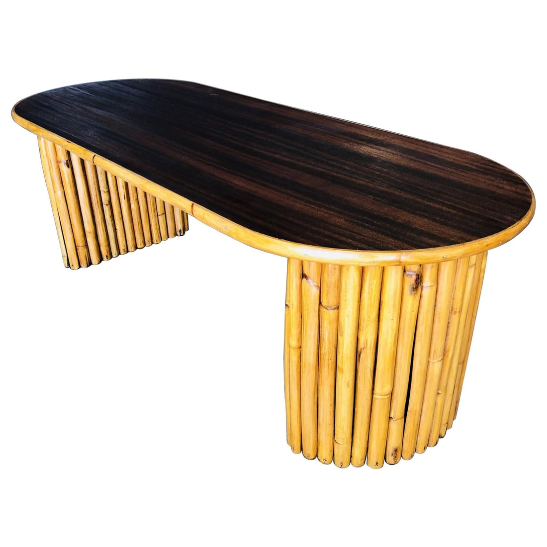 Restored Vertically Stacked Rattan Coffee Table with Mahogany Top: Title: Restored Vertically Stacked Rattan Coffee Table with Mahogany Top Description: This minimal yet elegant Paul T. Frankl inspired coffee table features two columns of vertically stacked rattan