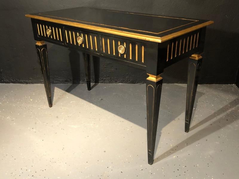 Ebony and Parcel-Gilt Decorated Three-Drawer Desk, Maison Jansen attr.: Title: Ebony and Parcel-Gilt Decorated Three-Drawer Desk, Maison Jansen attr. Description: Ebony and gilt Hollywood Regency desk. An ebony and parcel-gilt decorated three drawer desk or writing table.