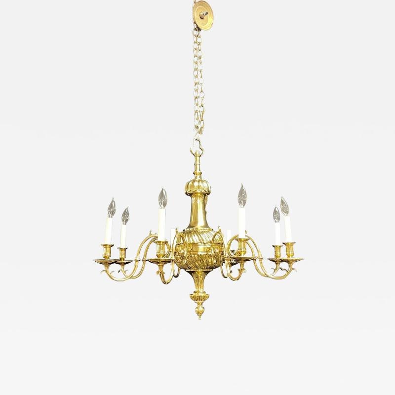 Bronze Georgian Style Chandelier having Eight Lights: Title: Bronze Georgian Style Chandelier having Eight Lights Description: Bronze Georgian style Chandelier having eight lights. A finely cast thick short and wide frame supporting Eight scrolled arms e