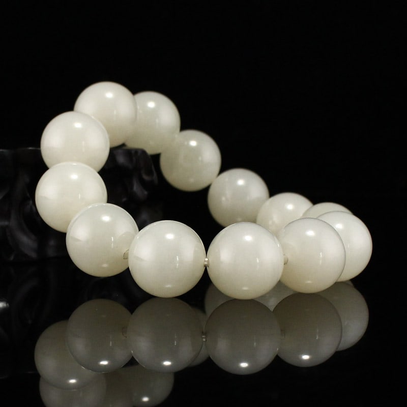20mm Hetian Jade Beads Bracelet: Title: 20mm Hetian Jade Beads Bracelet Origin: Chinese Date/Period: After2020 Materials: Hetian Jade Dimensions: 20(mm) 0.79(inches) Weight 0.26 lbs/116g Reserve: $379.00 Shipping:Domestic: