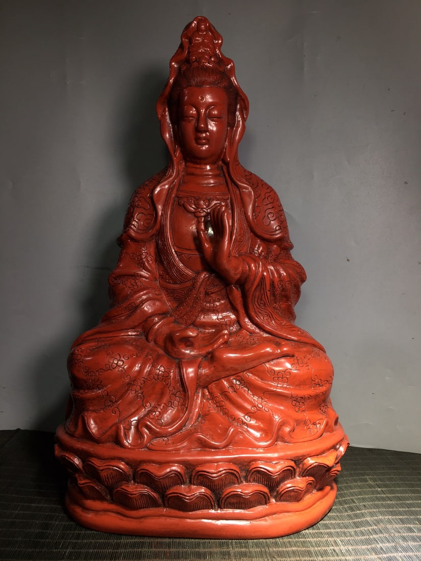Red Lacquerware Statue - Kwan-yin: Title: Red Lacquerware Statue - Kwan-yin Origin: Chinese Date/Period: After1880 Materials: Red Lacquerware Dimensions: 500x300(mm) 19.69x11.81(inches) Weight 9.17 lbs/4159g Reserve: $999.00 