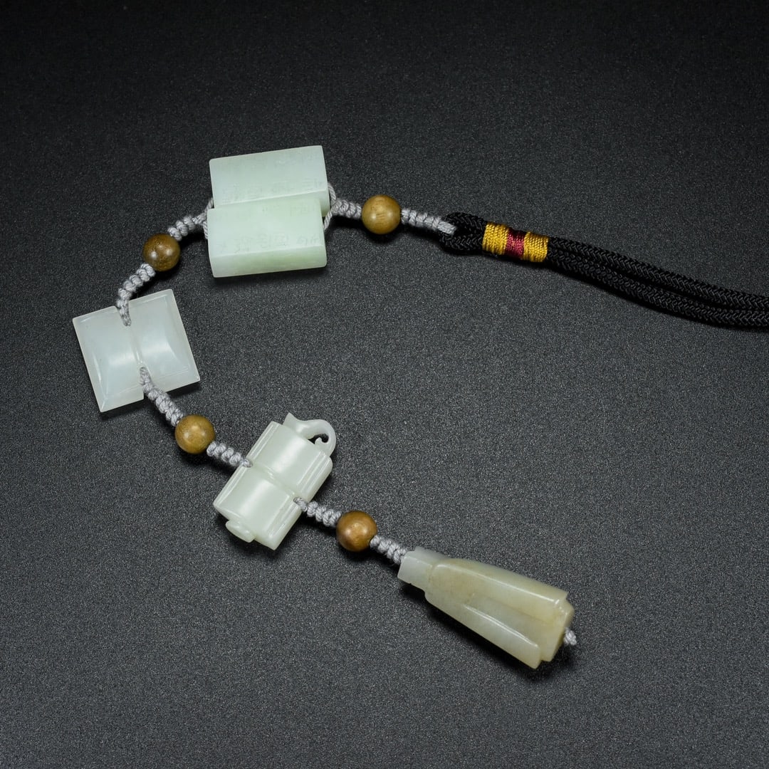 Hand knitting Hetian Jade Pendant: Title: Hand knitting Hetian Jade Pendant Origin: Chinese Date/Period: After1900 Materials: Hetian Jade Dimensions: 3x13x25(mm) 0.12x0.51x0.98(inches) Weight 0.10 lbs/47g Reserve: $599.00 