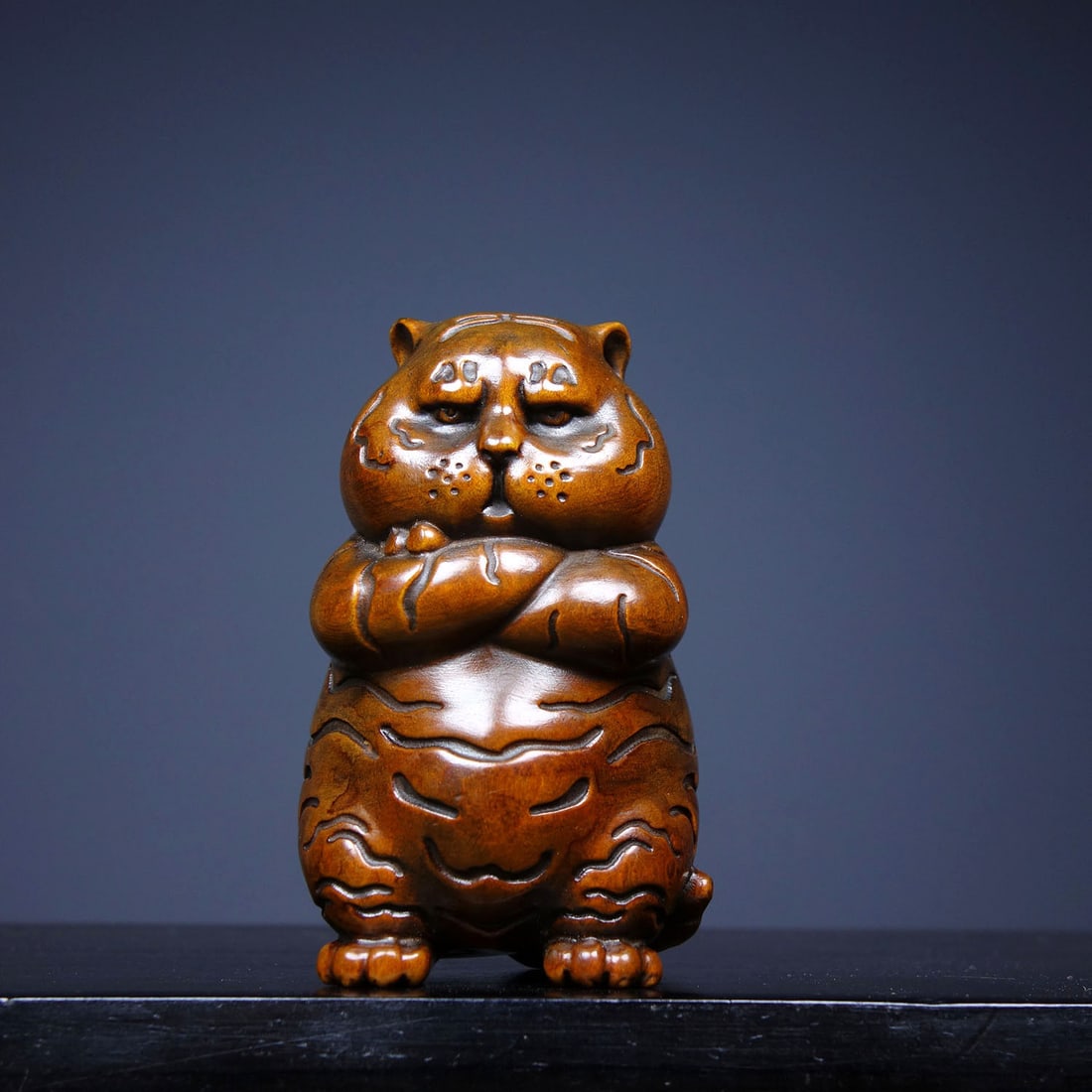 Boxwood Wood Statue - Small Tiger: Title: Boxwood Wood Statue - Small Tiger Origin: Chinese Date/Period: After1900 Materials: Boxwood Wood Dimensions: 65x45x40(mm) 2.56x1.77x1.57(inches) Weight 0.15 lbs/70g Reserve: $50.00 Shipping: D