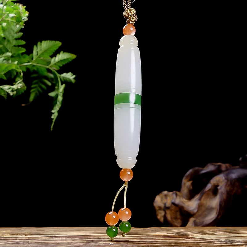 Hetian Jade Pendant - Lezi: Title: Hetian Jade Pendant - Lezi Origin: Chinese Date/Period: After2025 Materials: Hetian Jade Dimensions: 55x11(mm) 2.17x0.43(inches) Weight 0.03 lbs/13.6g Reserve: $499.00 Shipping: Domestic: Ship