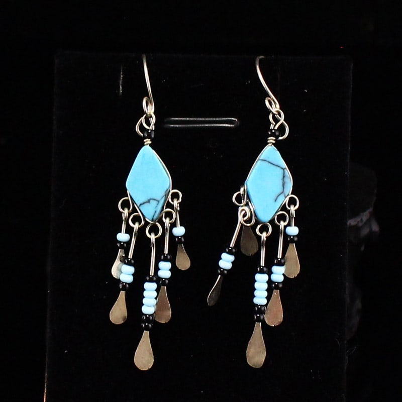 Silver Inlay Turquoise Earrings: Title: Silver Inlay Turquoise Earrings Origin: Chinese Date/Period: After2000 Materials: Silver,Turquoise Dimensions: Reserve: $120.00 Shipping:Domestic: Shipping rates are determined by