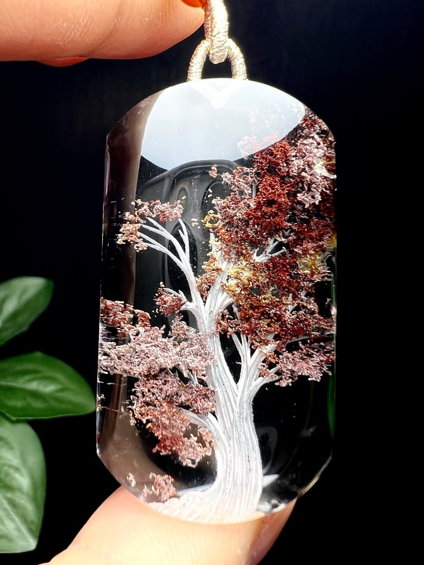 Natural Red Crystal Pendant - Tree: Title: Natural Red Crystal Pendant - Tree Origin: Chinese Date/Period: After2025 Materials: Red Crystal Dimensions: 46.5x25.5x13(mm) 1.83x1.00x0.51(inches) Weight 0.06 lbs/29g Reserve: $368.00 