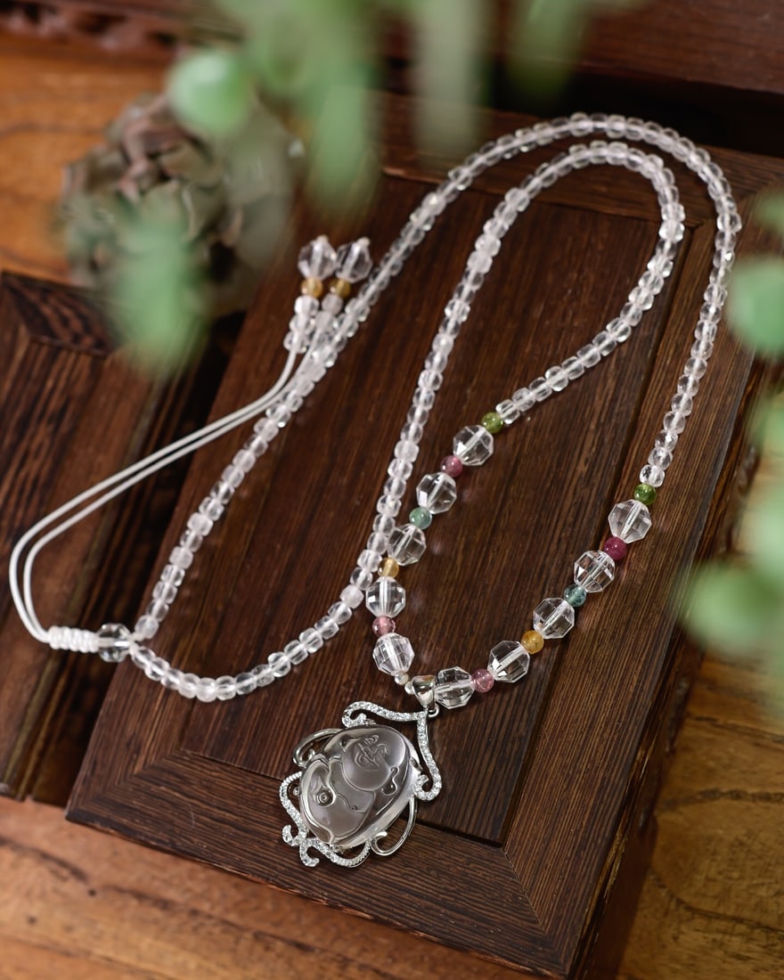 Silver Inlay White Crystal Laughing Buddha Pendant & White Crystal Necklace: Title: Silver Inlay White Crystal Laughing Buddha Pendant & White Crystal Necklace Origin: Chinese Date/Period: After2025 Materials: Silver,White Crystal Dimensions: 4(mm) 0.16(inches) Necklace