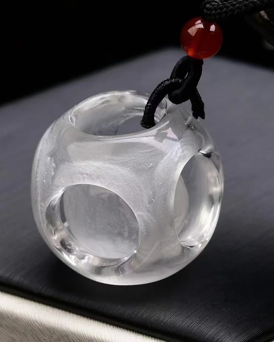 Natural White Crystal Lucky Ball Pendant: Title: Natural White Crystal Lucky Ball Pendant Origin: Chinese Date/Period: After2025 Materials: Crystal Dimensions: 30x30x30(mm) 1.18x1.18x1.18(inches) Weight 0.05 lbs/24g Reserve: $135.00 