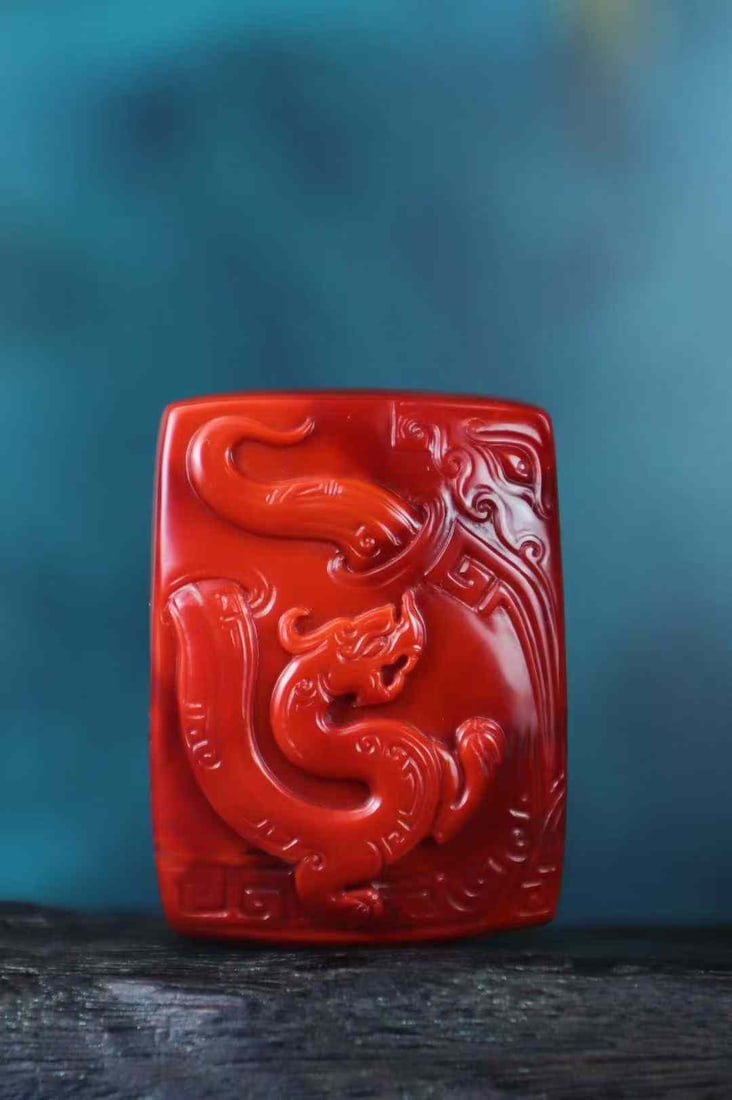 Nanhong Agate Pendant - Dragon,Certificate: Title: Nanhong Agate Pendant - Dragon,Certificate Origin: Chinese Date/Period: After2025 Materials: Nanhong Agate Dimensions: 32.6x44x16.6(mm) 1.28x1.73x0.65(inches) Weight 0.10 lbs/46.5g Reserve: